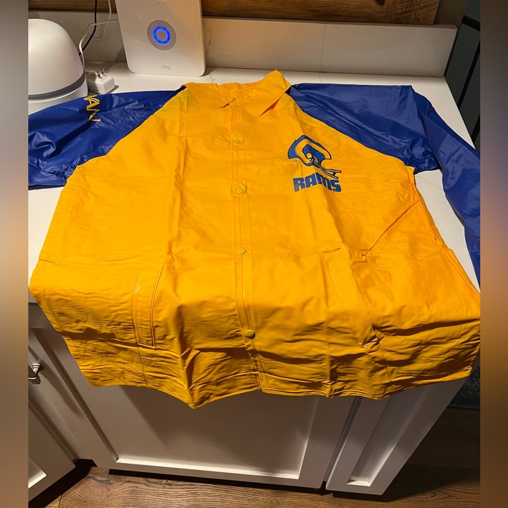 Vintage Rams raincoat brand new.  A must for football season